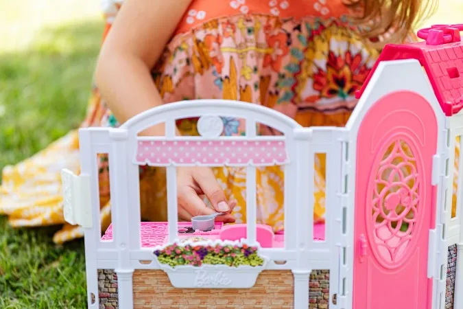 A photo of a Barbie house.